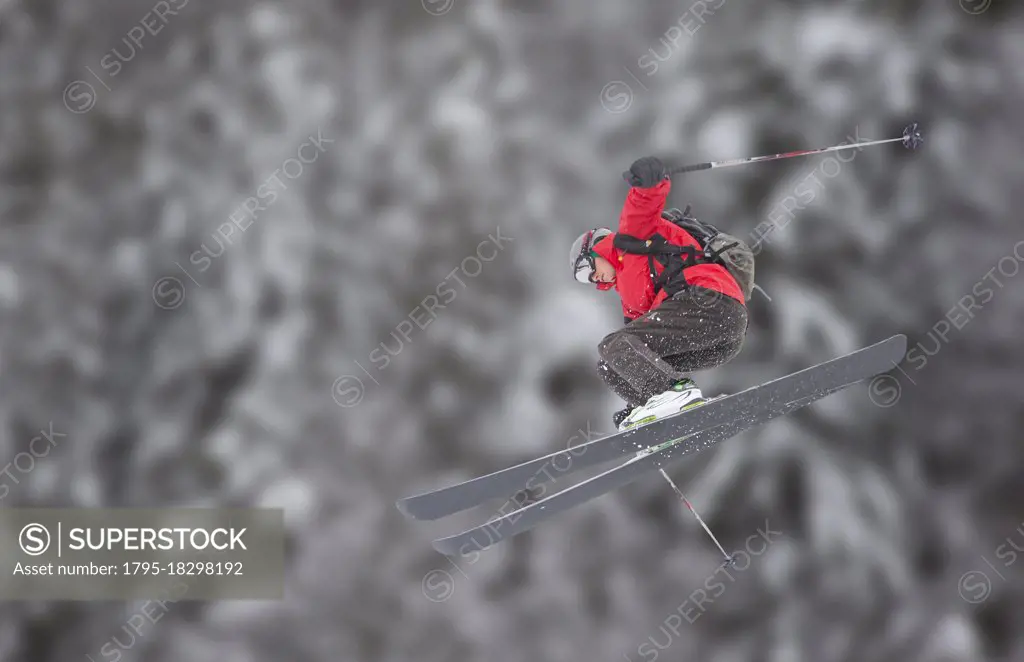 France, Haute Savoie, Chamonix, Mont Blanc, Skier jumping on snowy slope