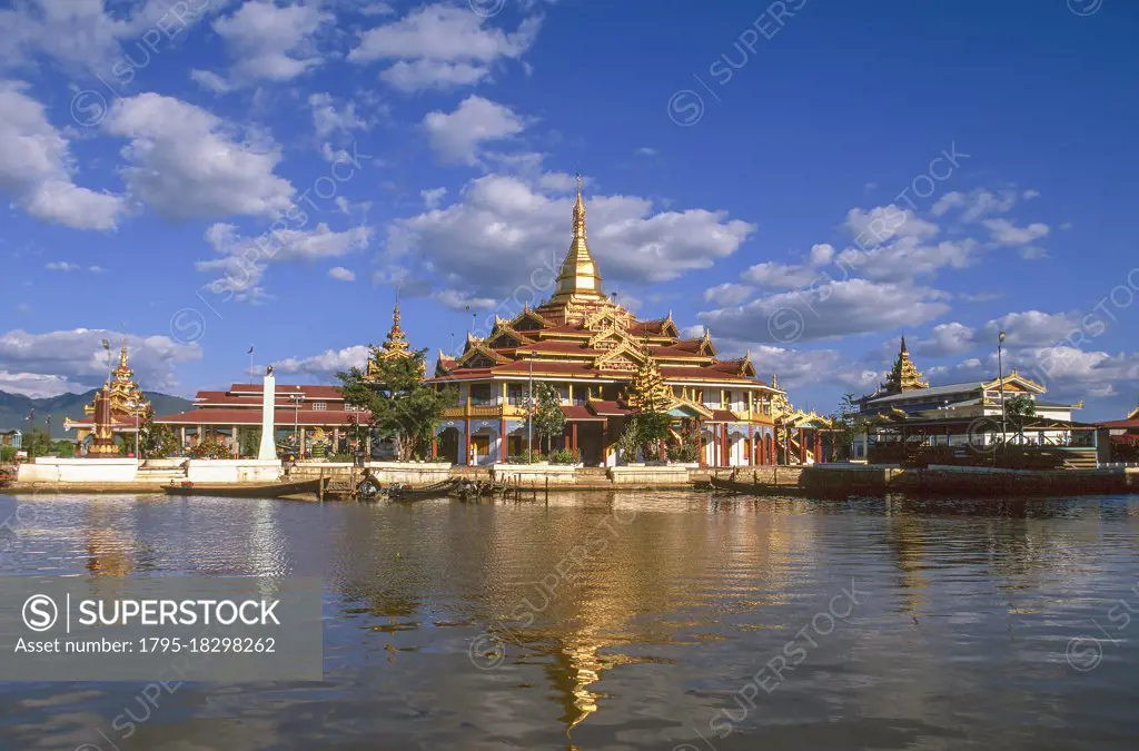 Myanmar, Shan State, Inle Lake, Buddhist temple reflecting in lake