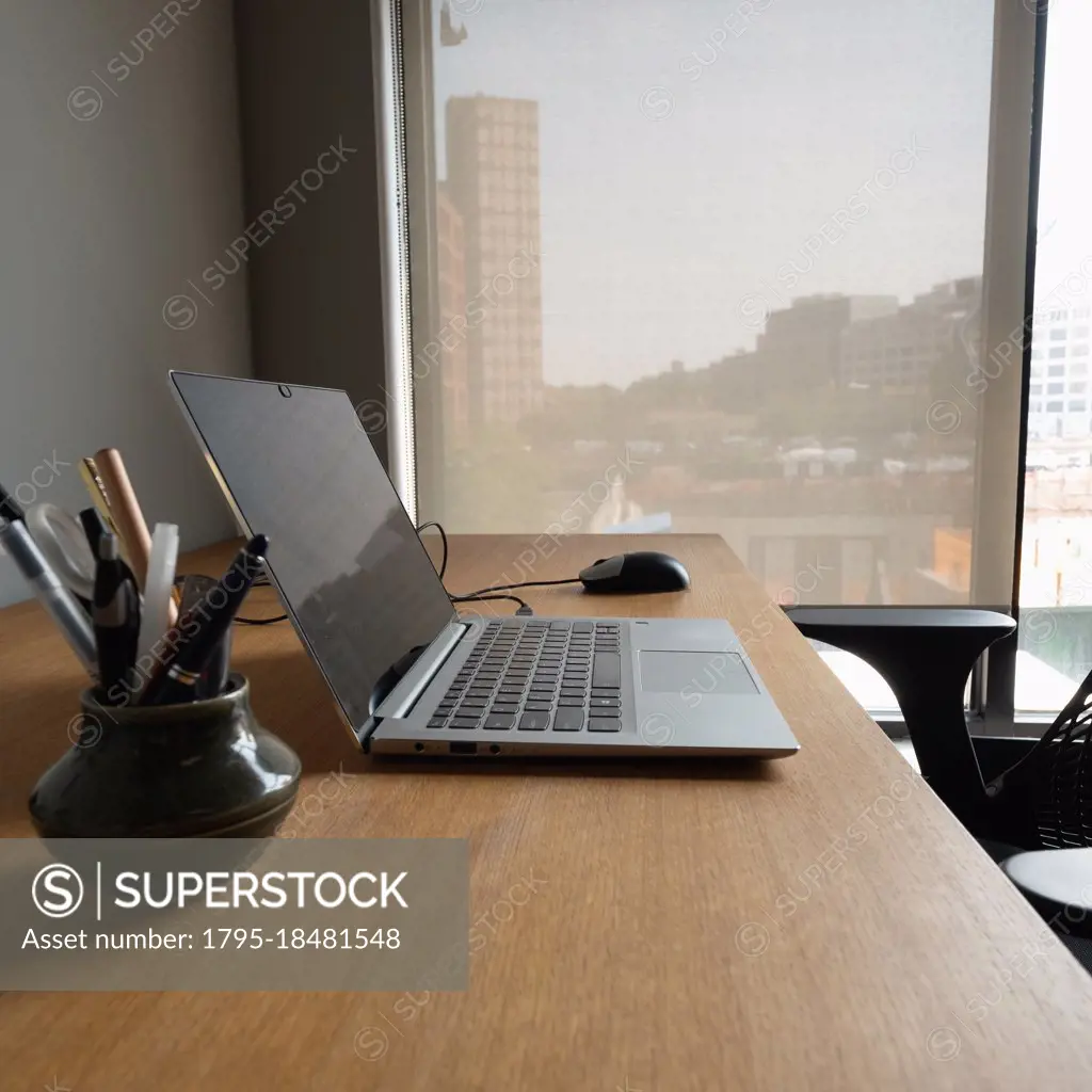 Open laptop on business desk