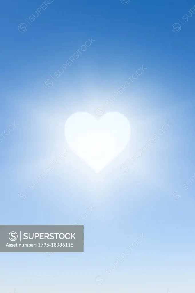 White heart against blue sky