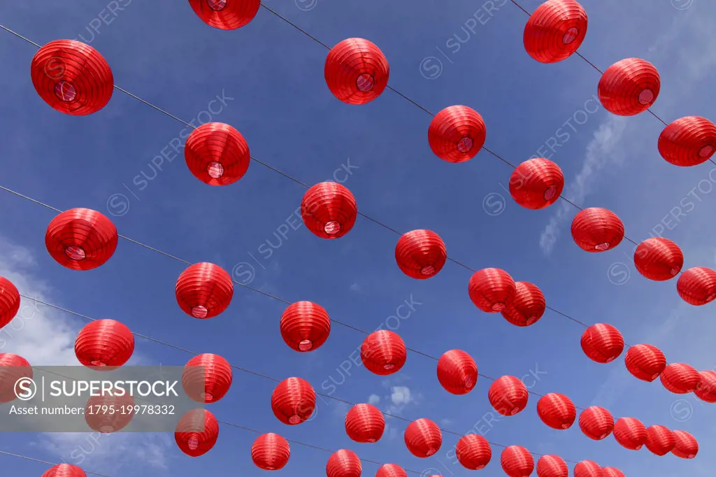 Chinese lanterns against blue sky