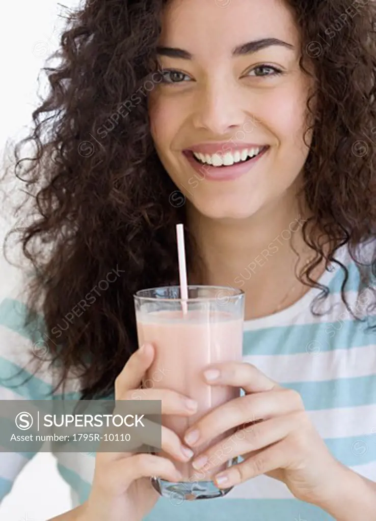 Woman drinking milkshake