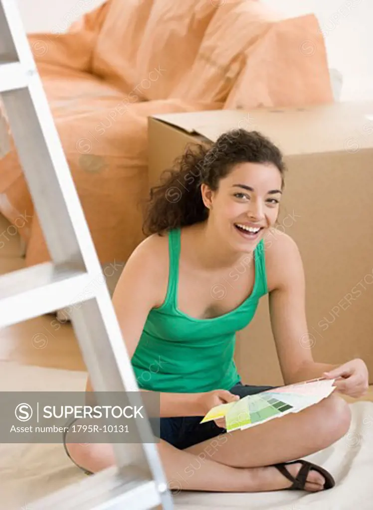 Woman looking at paint swatches