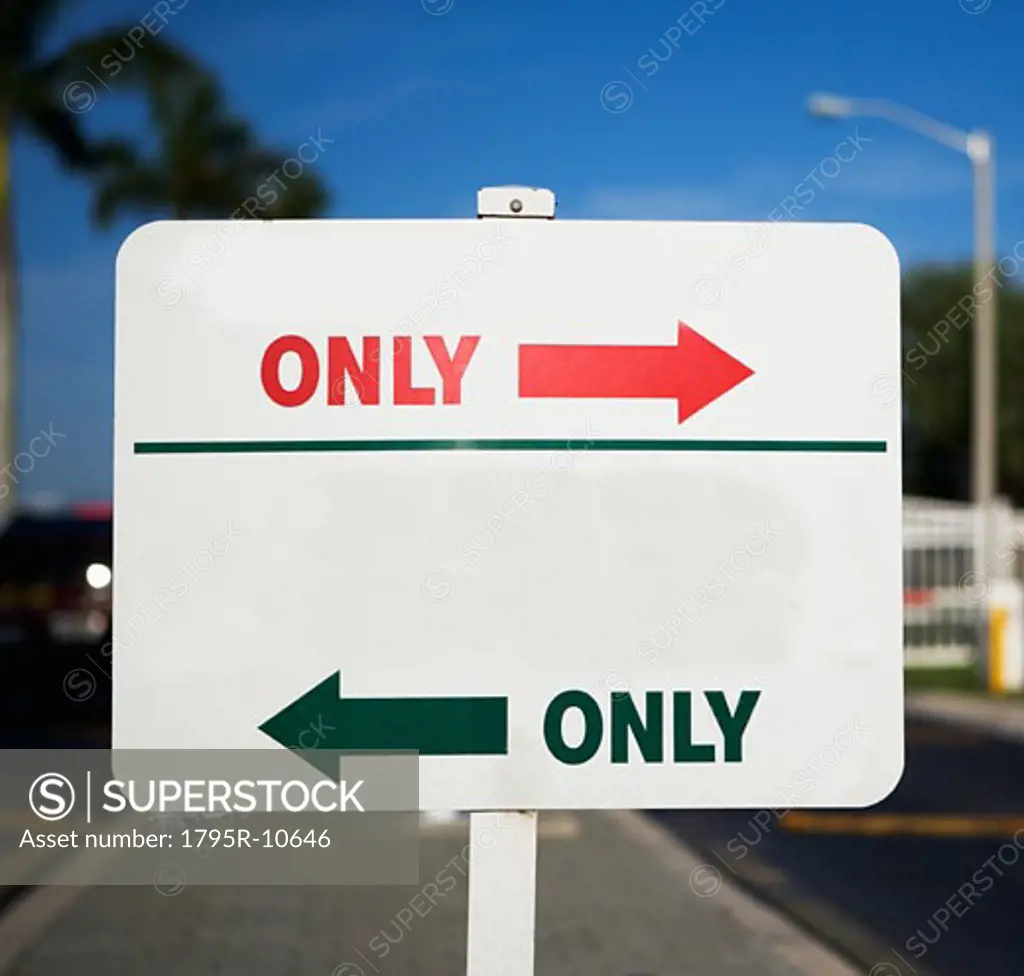One Way and arrow street signs