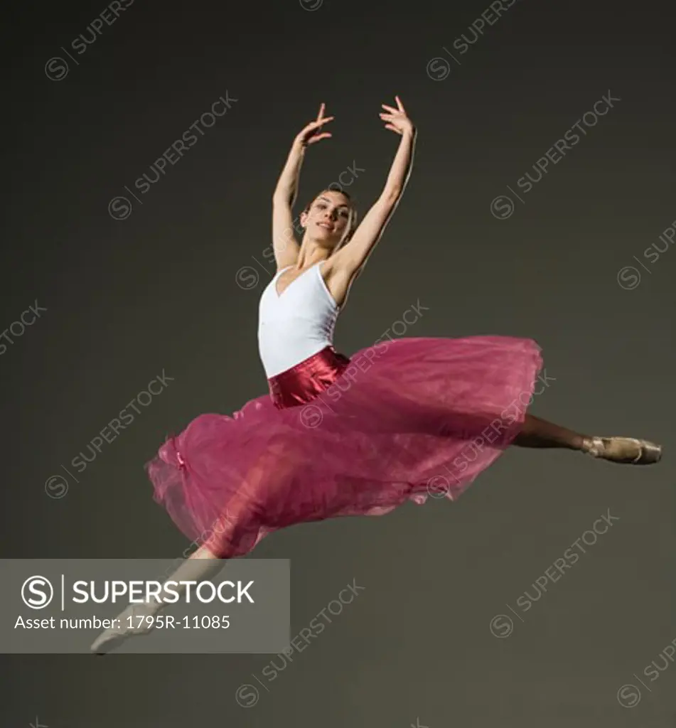 Female ballet dancer jumping