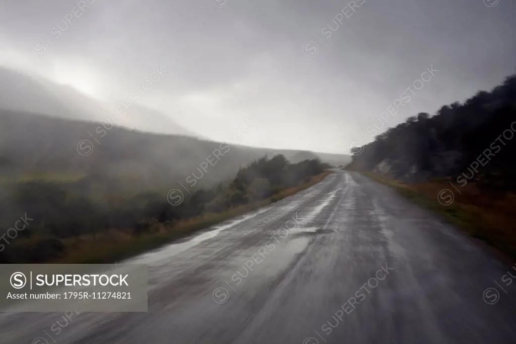 Wet, foggy, mountain road
