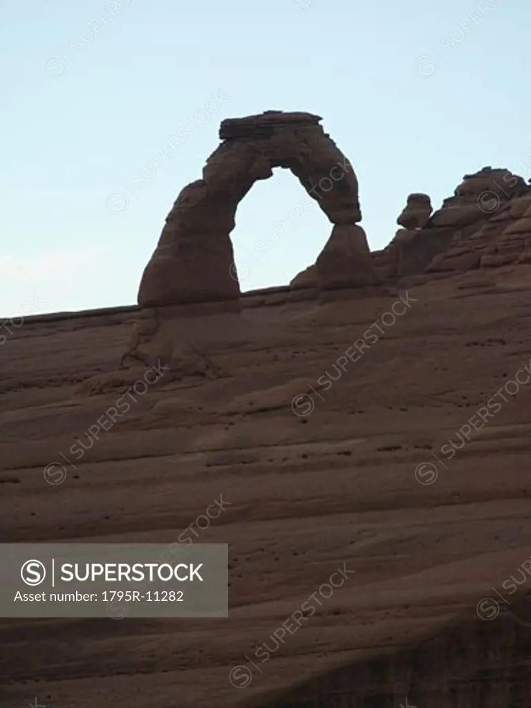 View through rock formation to blue sky