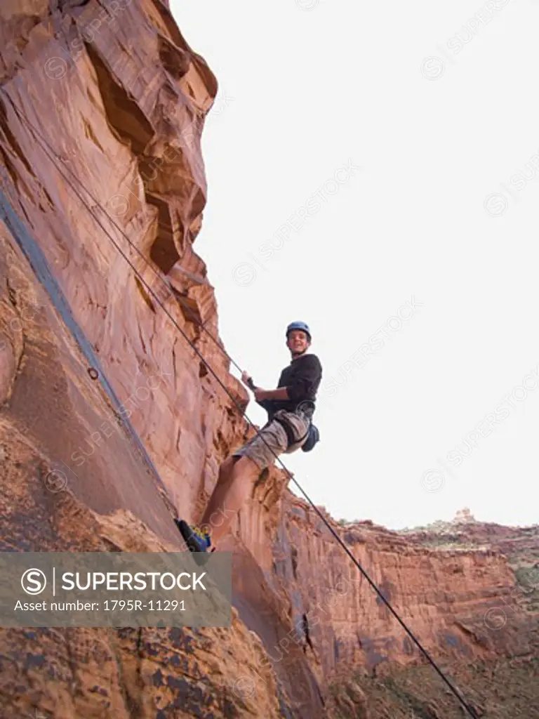 Man rock climbing