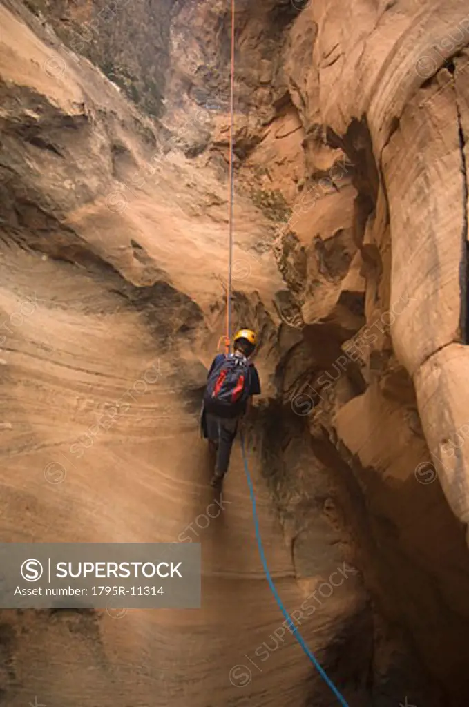 Person canyon rappelling