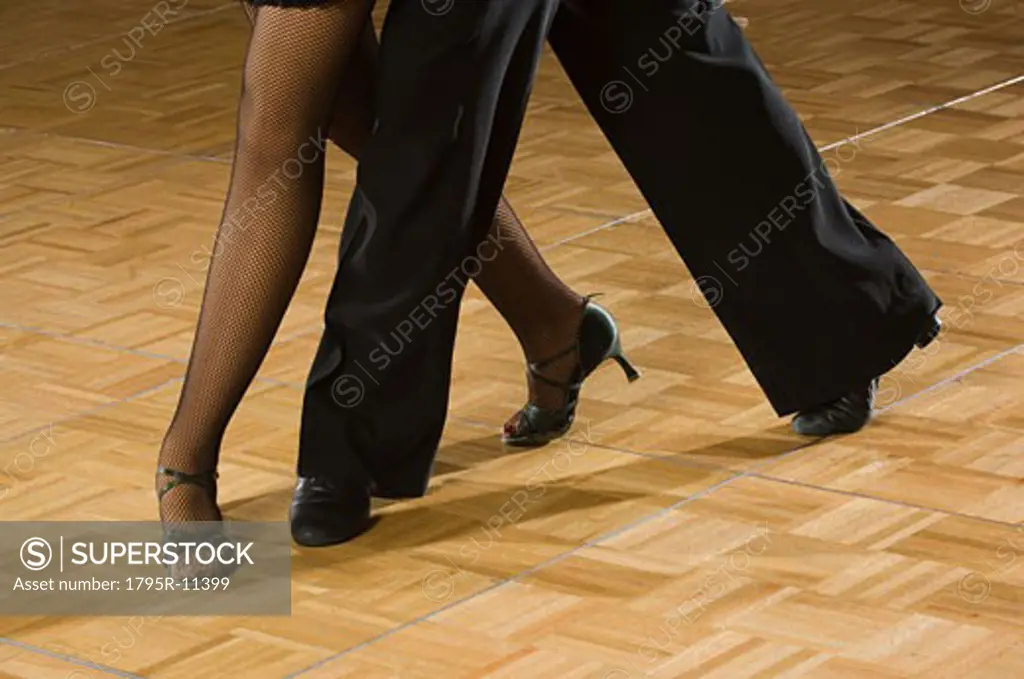 Close-up of couple salsa dancing