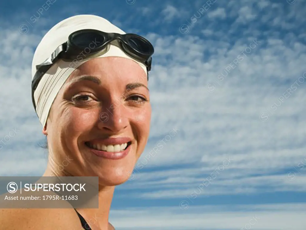 Woman wearing swimming cap and goggles, Utah, United States