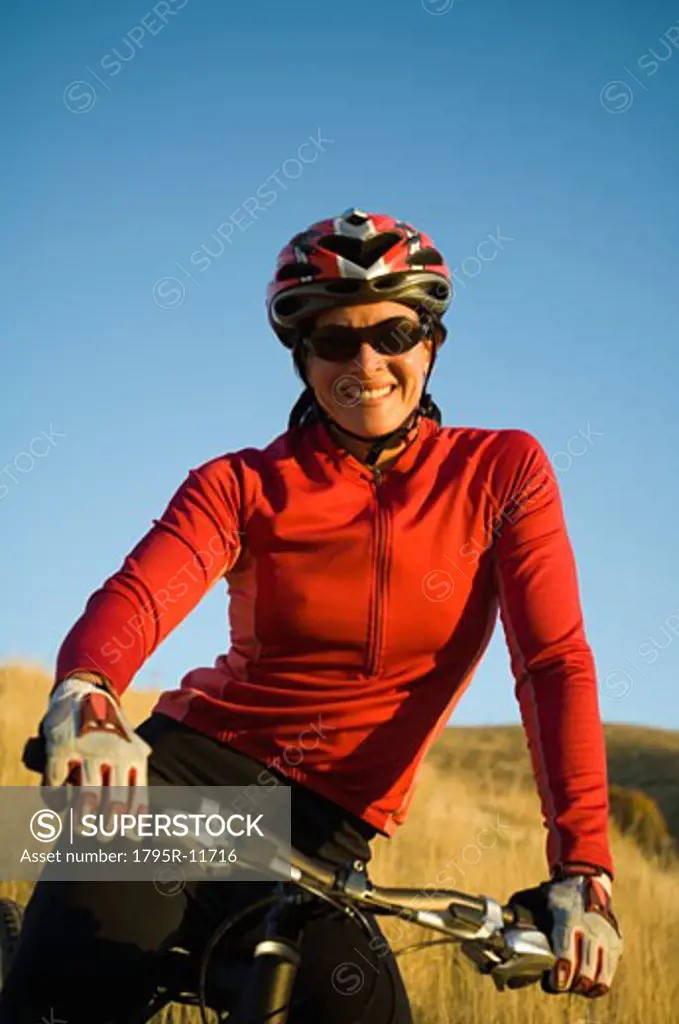 Woman on mountain bike, Salt Flats, Utah, United States