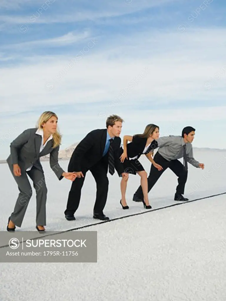 Business people at starting line for race, Salt Flats, Utah, United States