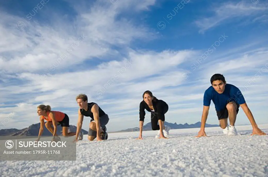 People at starting line on salt flats, Utah, United States