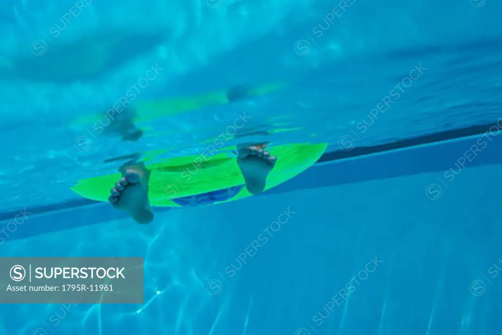 Underwater shot of childs feet, Florida, United States