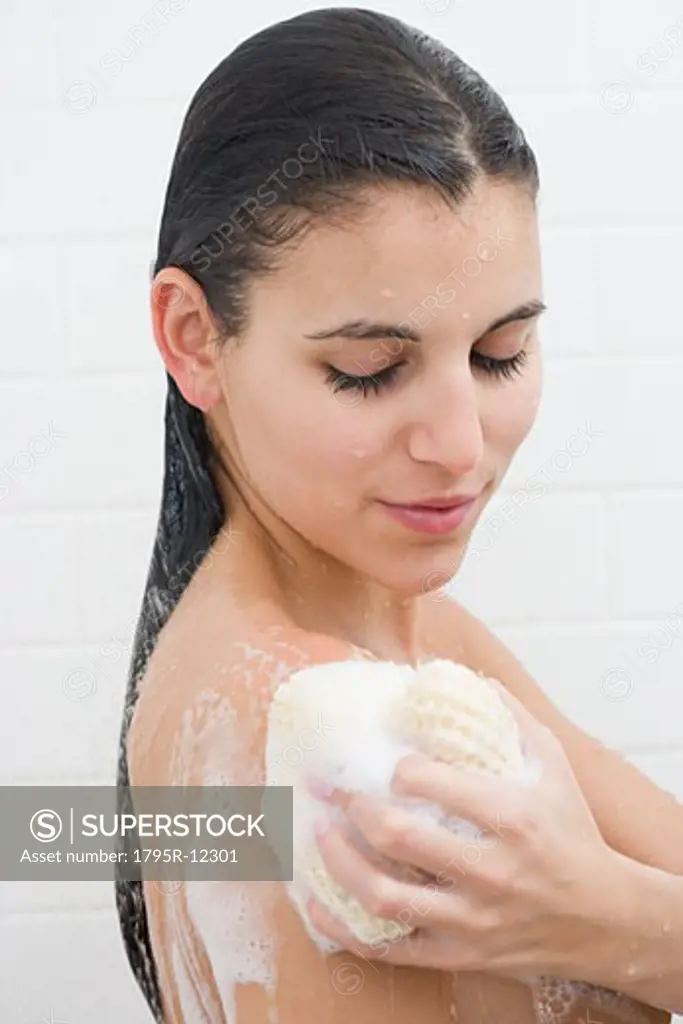 Woman washing in shower