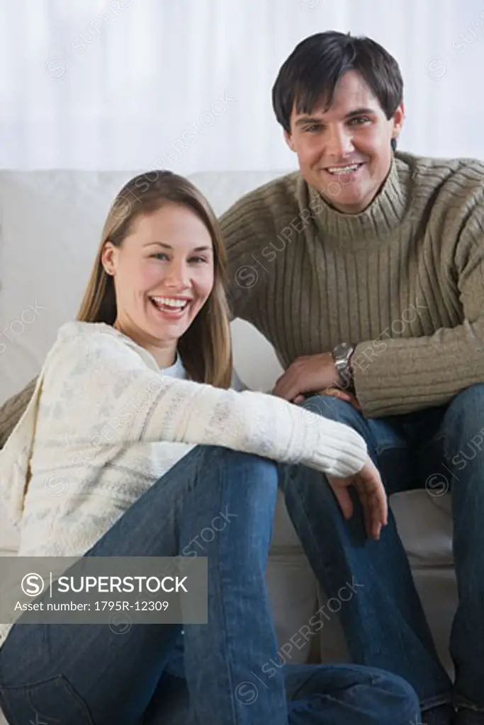 Couple sitting in livingroom
