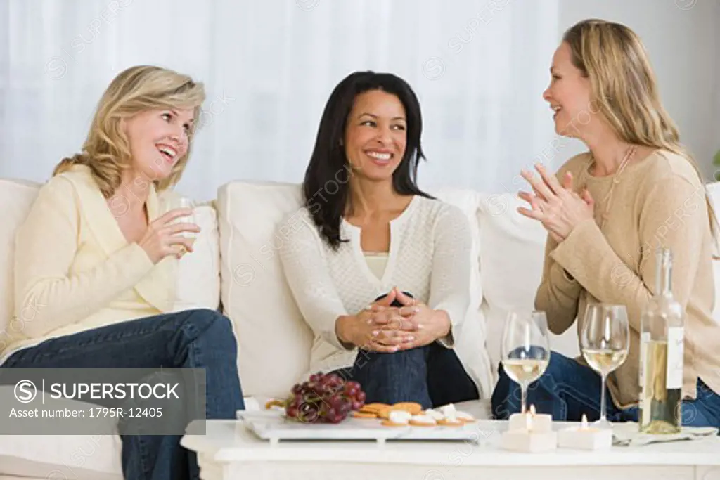 Multi-ethnic women laughing