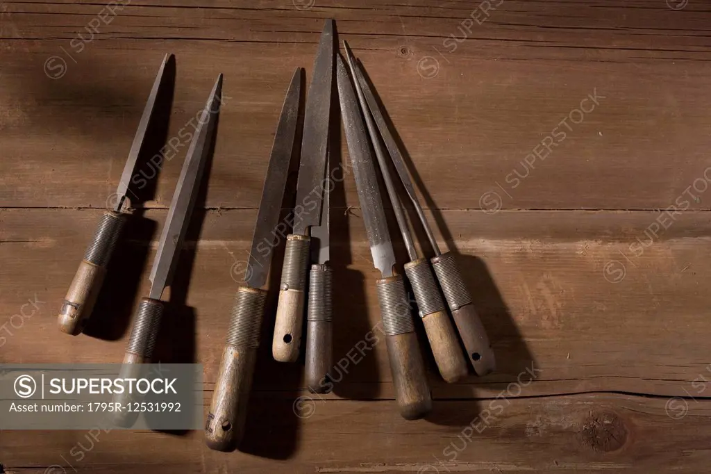Silversmith's tools arranged on workbench