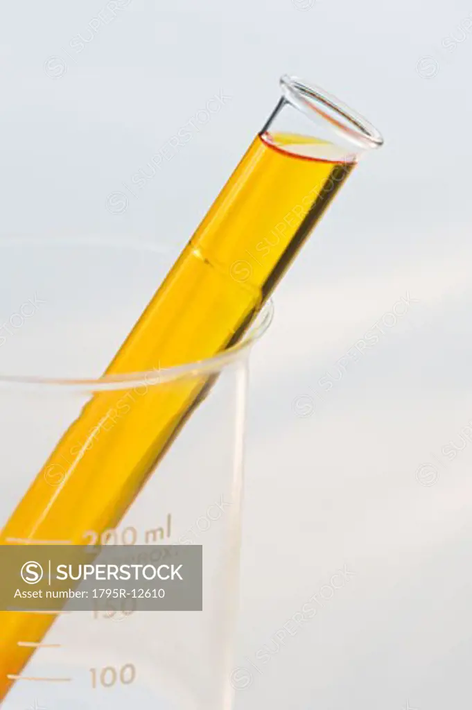 Vial of liquid in beaker