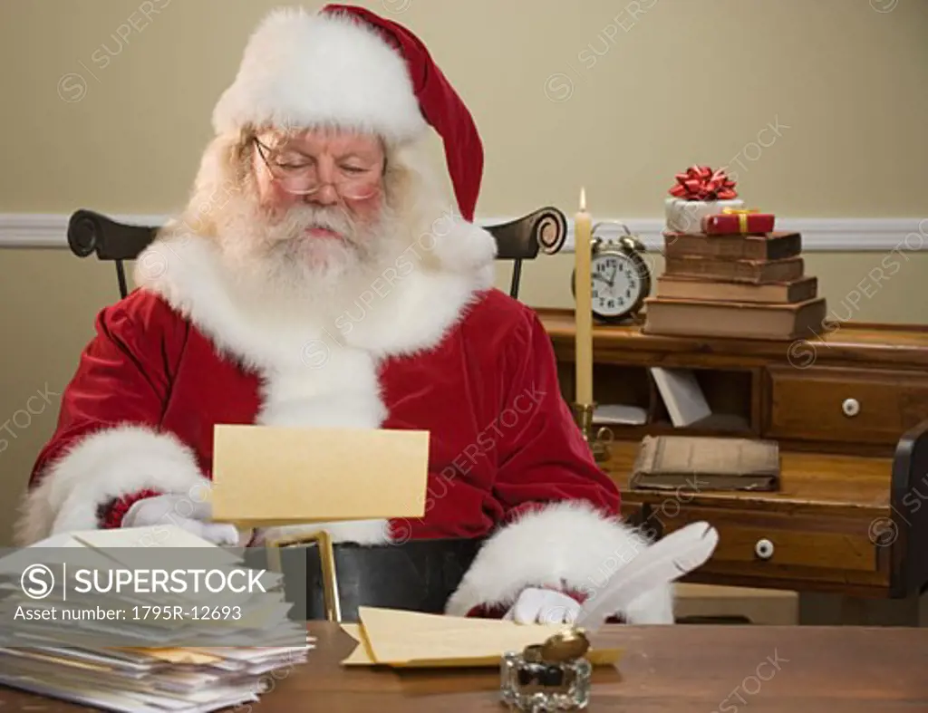 Santa Claus reading mail