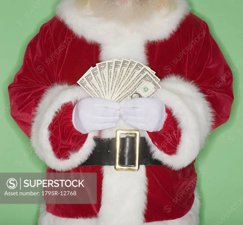 Santa Claus holding fanned out money
