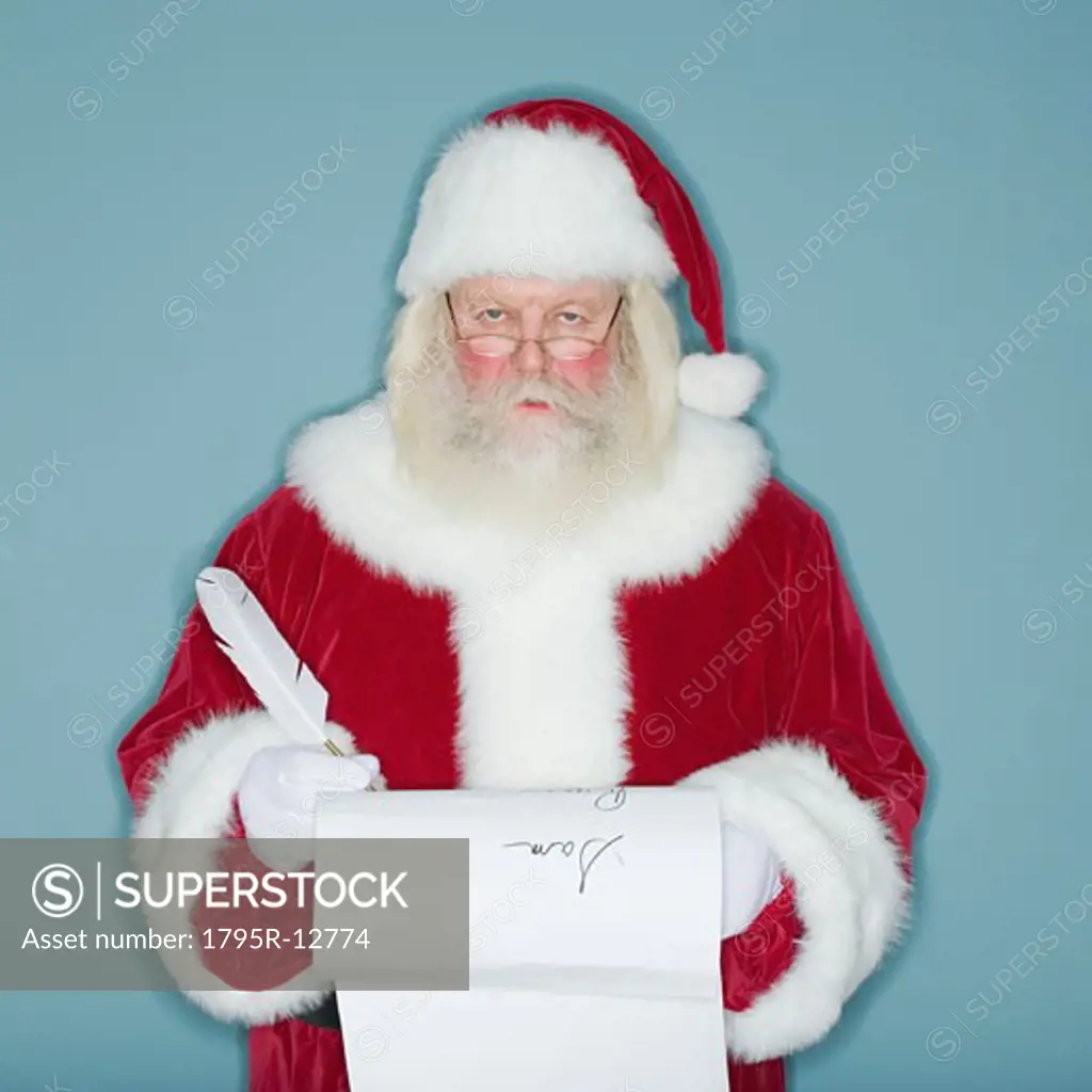 Santa Claus writing list of names