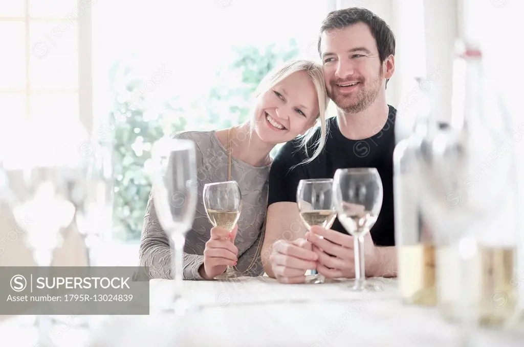 Couple sitting at table