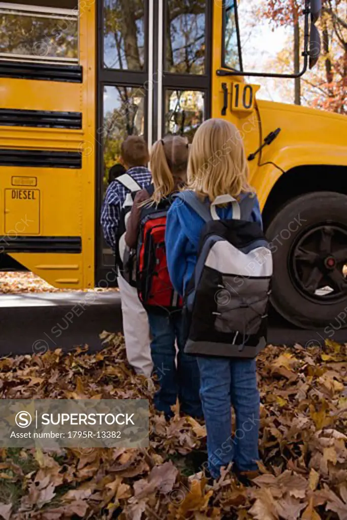 Children in line for school bus
