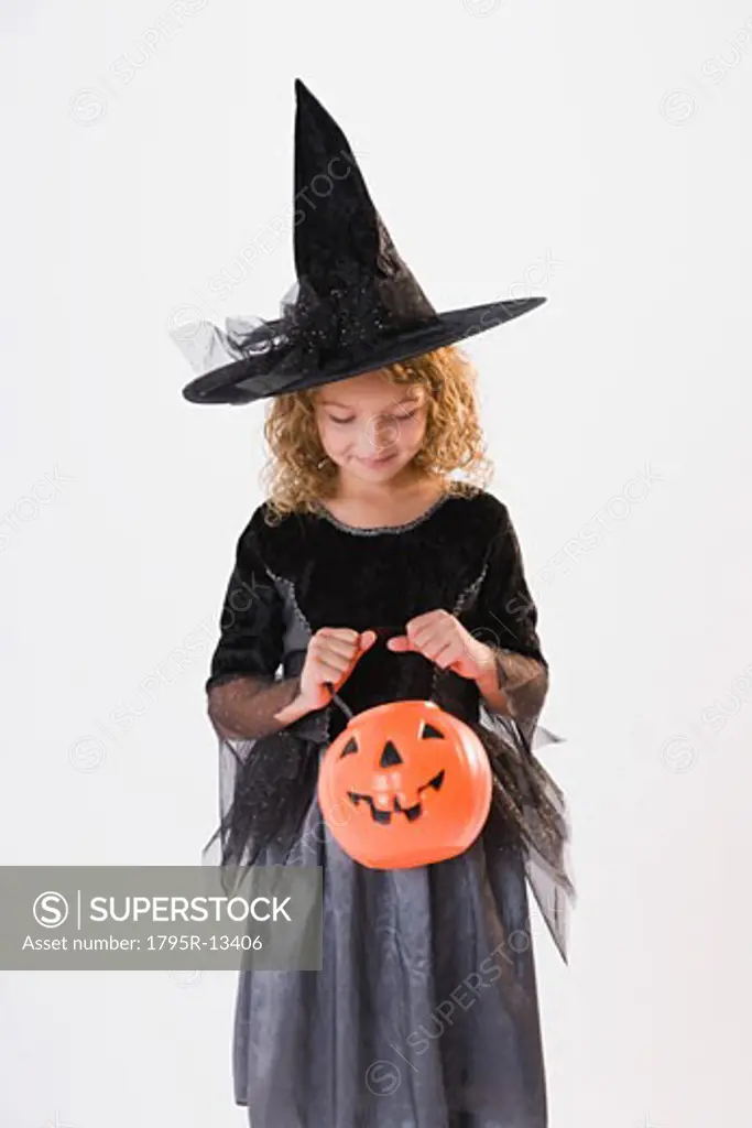 Girl dressed in witch Halloween costume