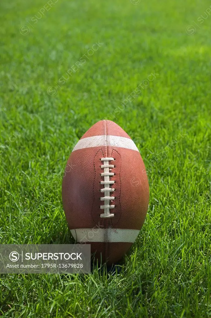 Close up of football in grass