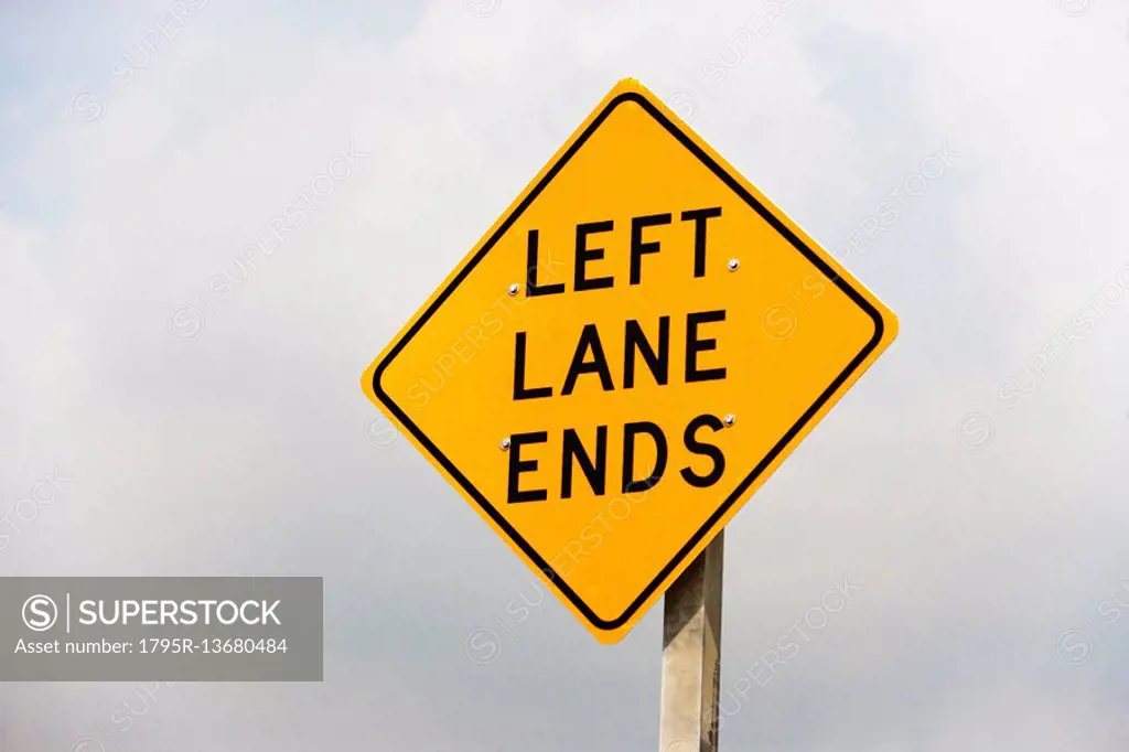 Left Lane Ends street sign