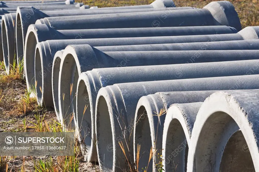 Concrete pipes on ground