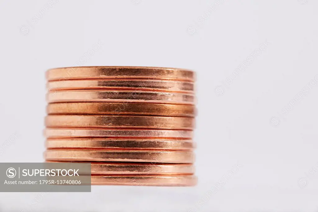 Stack of coins on white background