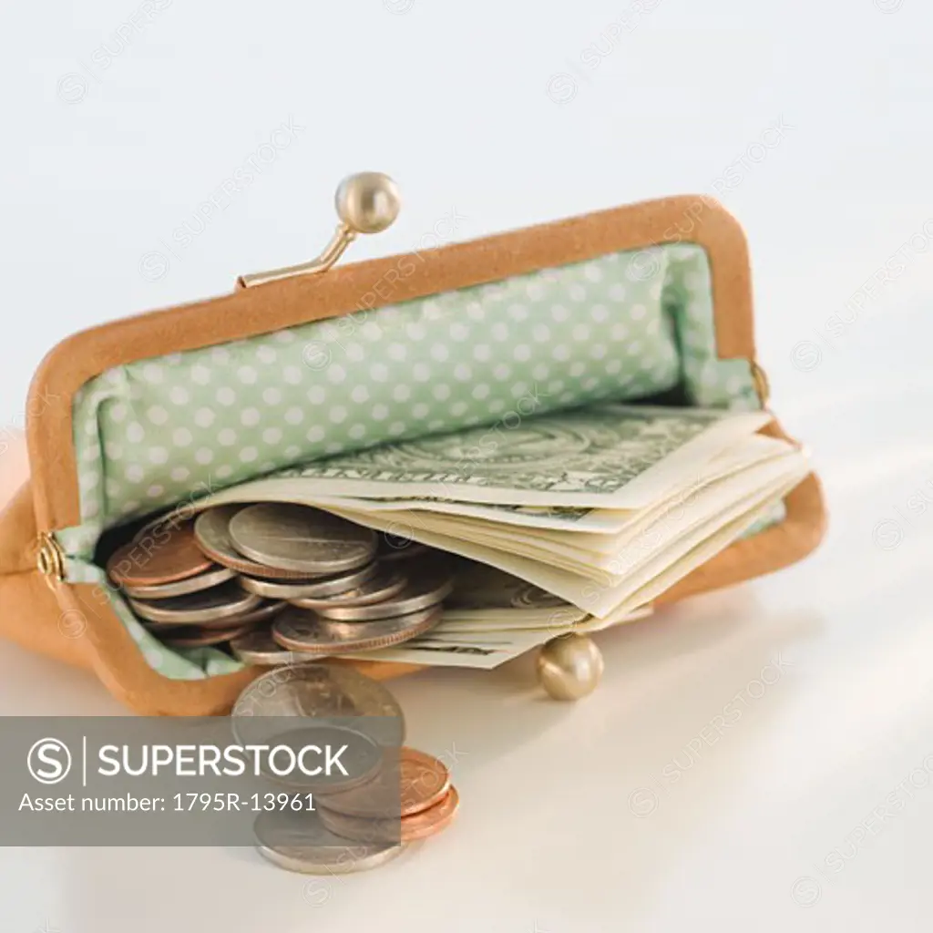Money in open change purse