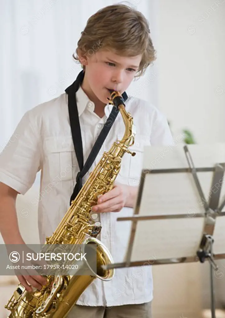 Boy playing saxophone