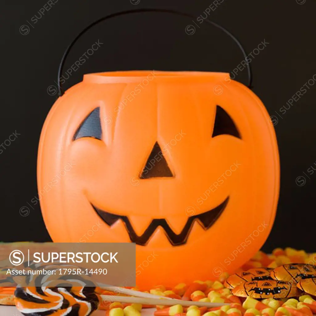 Jack-o-lantern pail and Halloween candy