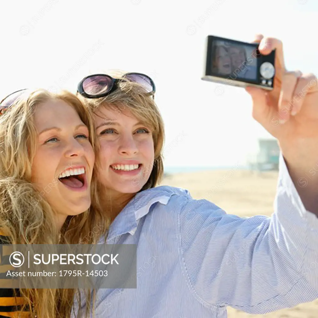 Two young women taking self-portrait