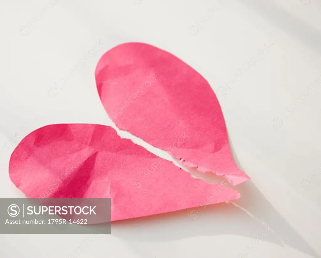Paper heart ripped in half