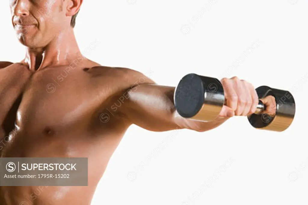 Male body builder flexing lifting weight