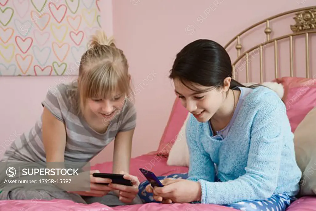 Girls looking at cell phones