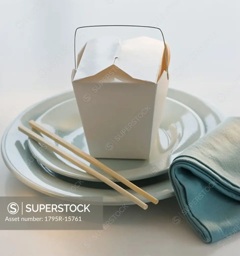 Takeout food and placesetting