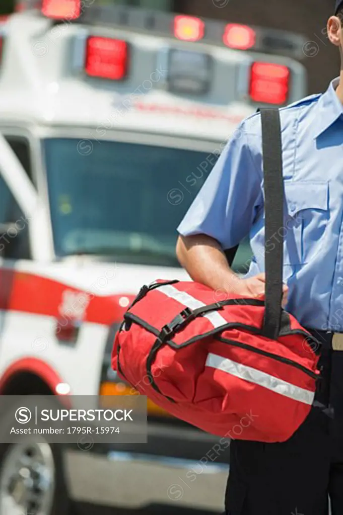 EMT carrying medical kit