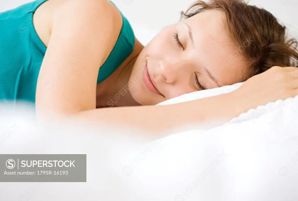 Close-up of teenage girl sleeping
