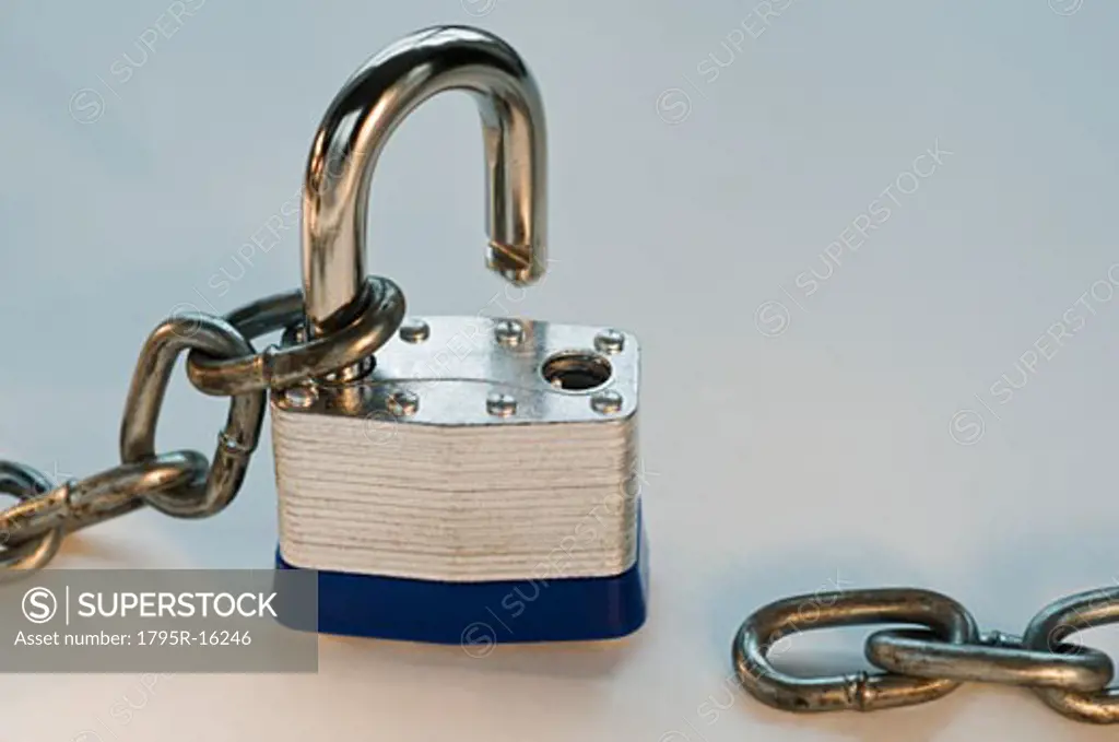 Close-up of lock and metal chain