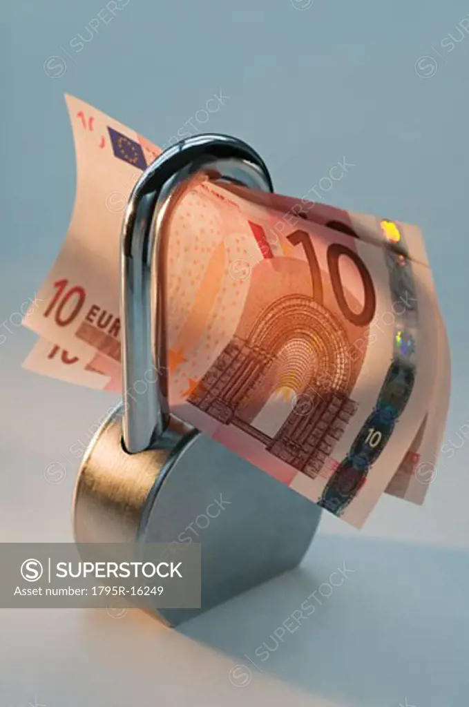 Close-up lock and paper euros