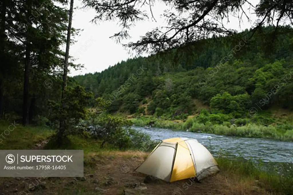 Tent and campsite by river