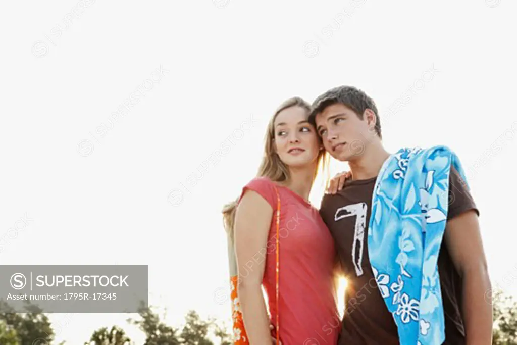 Young couple posing at beach