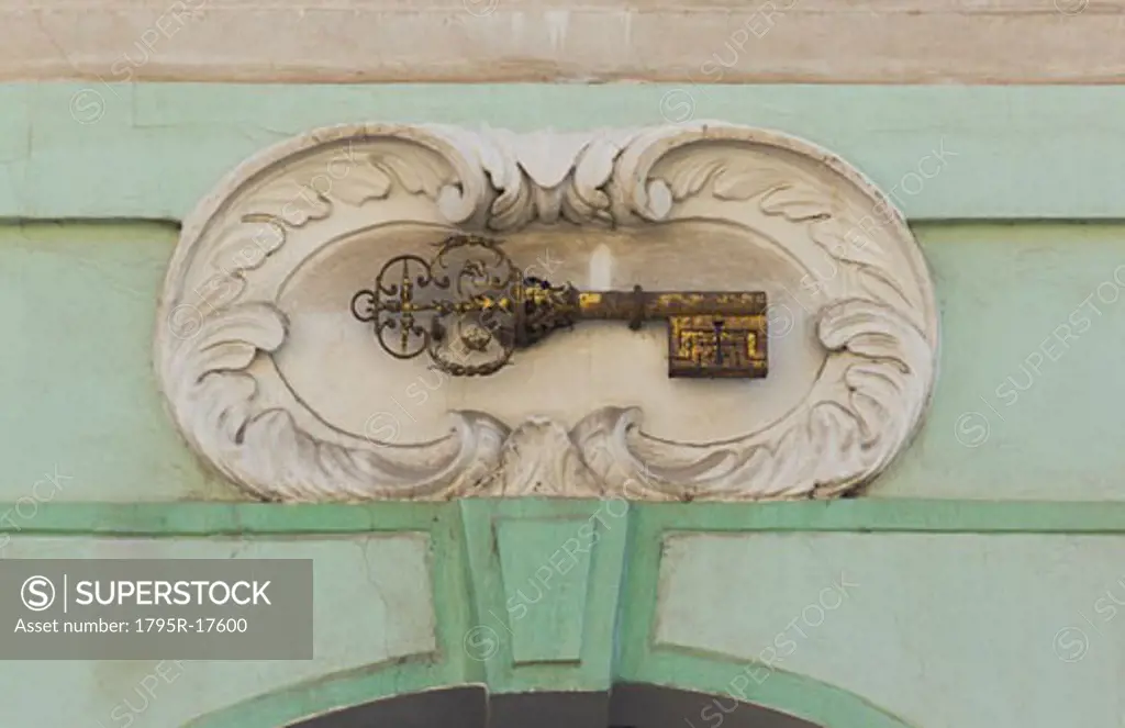 Gold key plaque to identify house, Prague