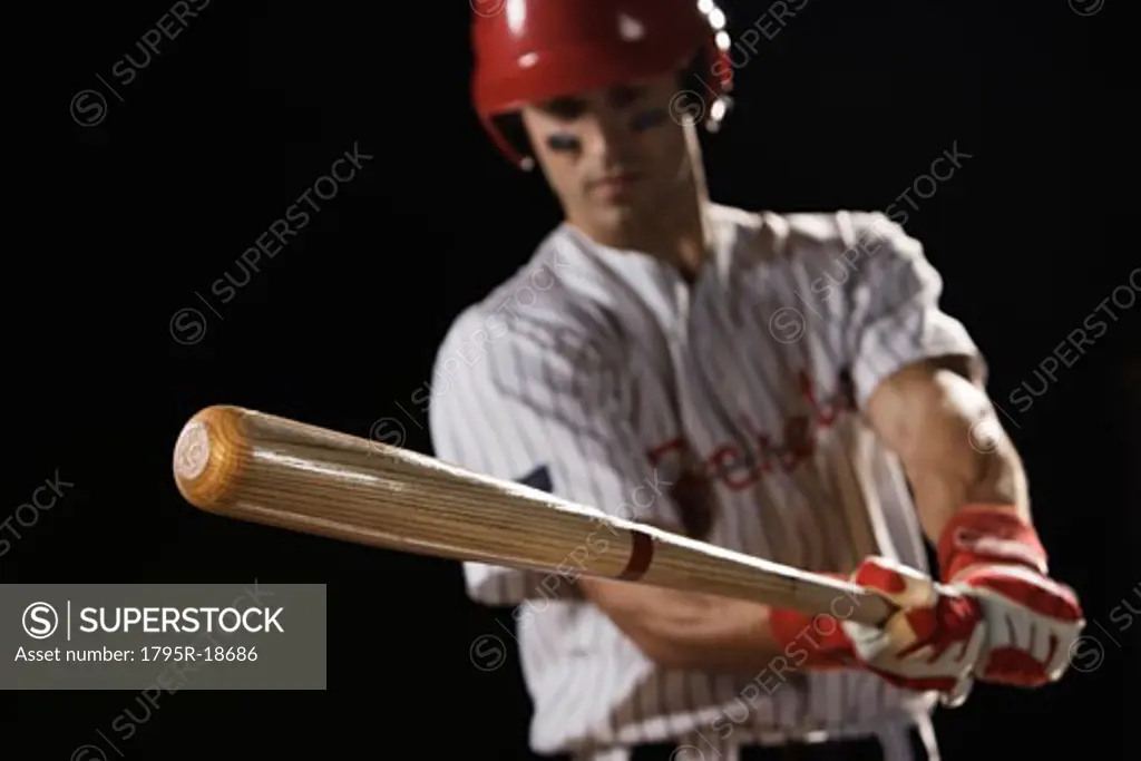 Baseball player swinging bat